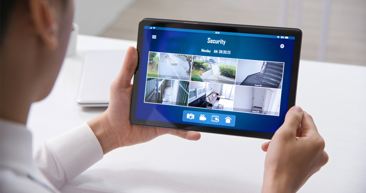Tablet showing different security camera angles, providing high level of smart home automation